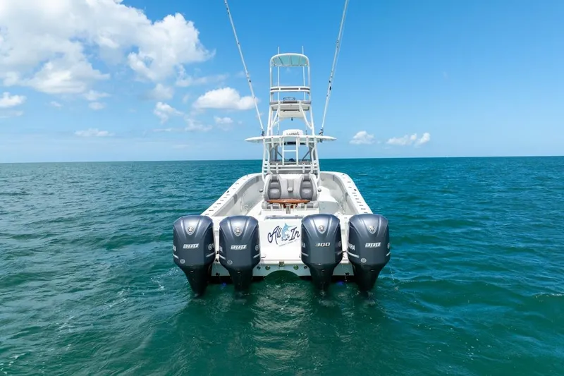 Slide: The Image of 2018 Freeman 37VH boat with four Yamaha 300 engines on open sea. - 7