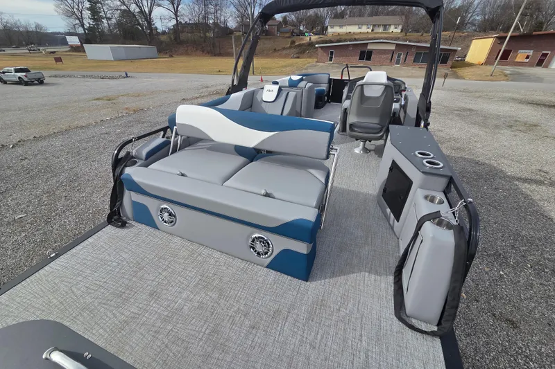 Slide: The Image of 2026 Avalon Platinum LSZ 2585 Cruise Rear Bench boat with modern seating and amenities. - 13