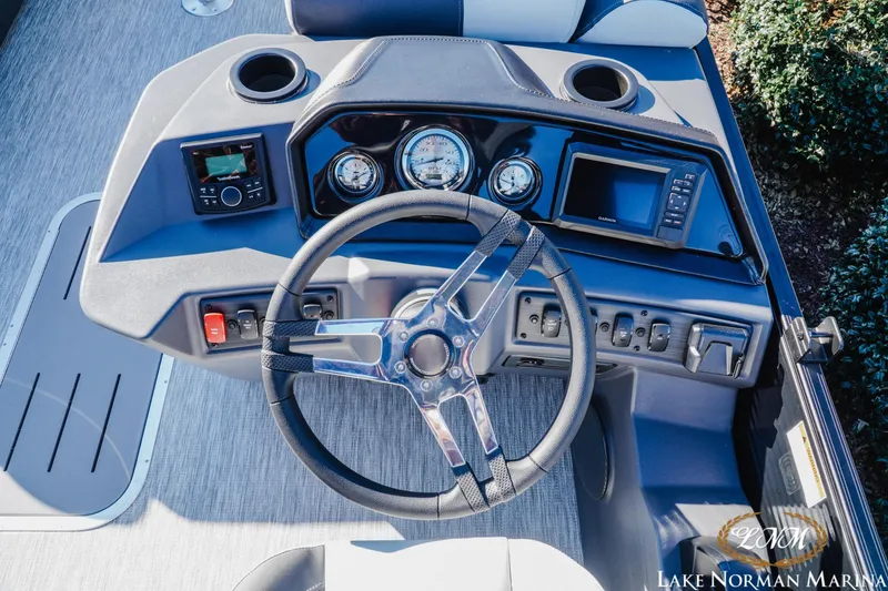 Slide: The Image of Steering console of 2026 Bennington 22SSB SNAP boat with modern controls and displays. - 10
