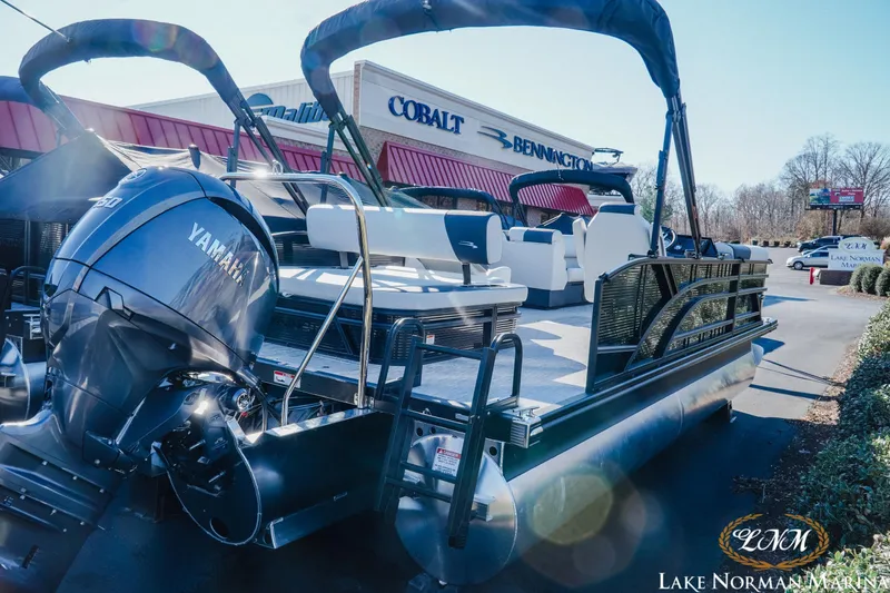 Slide: The Image of 2026 Bennington 22SSB SNAP pontoon boat with Yamaha engine at Lake Norman Marina. - 4