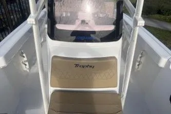 Slide: The Image of 2022 Trophy T22 boat interior with seating and console view. - 11