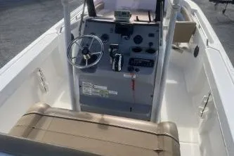 Slide: The Image of 2022 Trophy T22 boat interior with steering wheel and control panel. - 8