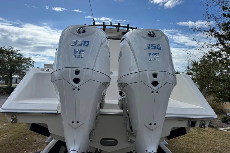Slide: The Image of 2026 Solace 30 CS boat with twin 350 V6 outboard engines. - 4