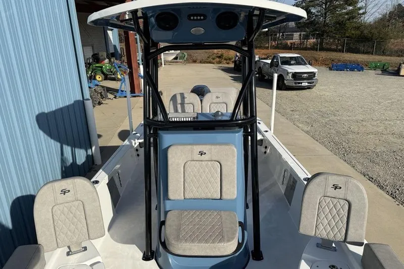 Slide: The Image of 2024 Sea Pro 230 Bay boat with modern seating and sleek design. - 11