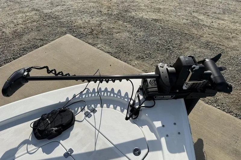 Slide: The Image of 2024 Sea Pro 230 Bay boat with Minn Kota trolling motor on deck. - 12