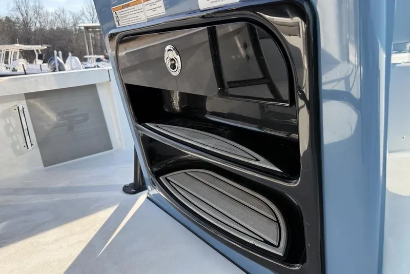 Slide: The Image of 2024 Sea Pro 230 Bay boat console with storage compartments. - 24