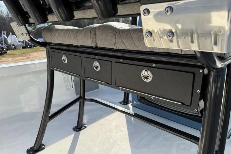 Slide: The Image of 2024 Sea Pro 230 Bay boat storage compartments and seating detail. - 27