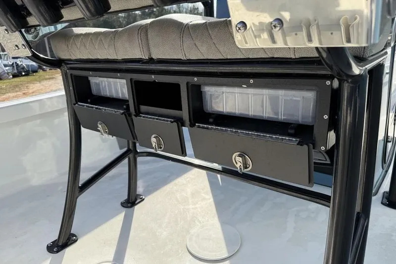 Slide: The Image of 2024 Sea Pro 230 Bay boat storage compartments with secure locking drawers. - 41