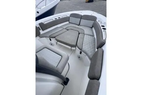 Slide: The Image of 2021 Sea Fox 228 Commander boat interior with cushioned seating arrangement. - 5