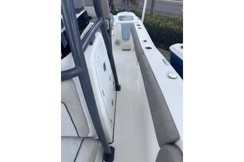 Slide: The Image of 2021 Sea Fox 228 Commander boat interior with seating and storage compartments. - 8