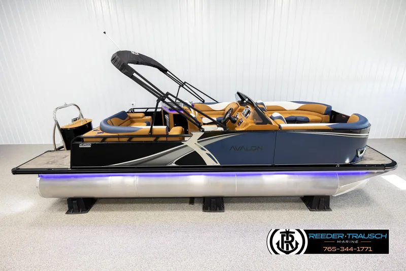 The Image of 2026 Avalon LSZ ELW pontoon boat with sleek design and luxurious seating. - 1