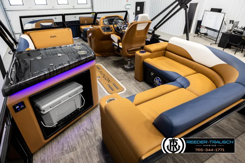 Slide: The Image of Luxurious interior of 2026 Avalon LSZ ELW pontoon boat with modern seating and amenities. - 11