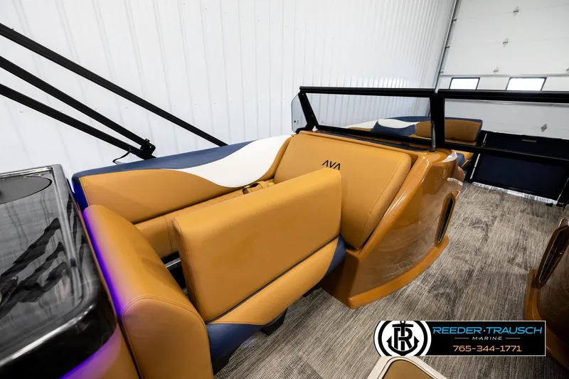 Slide: The Image of 2026 Avalon LSZ ELW boat interior with tan and blue seating, modern design. - 25