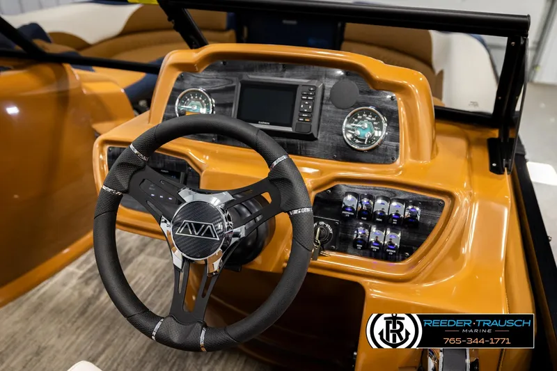 Slide: The Image of 2026 Avalon LSZ ELW boat dashboard with steering wheel and control panel. - 27