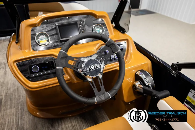 Slide: The Image of 2026 Avalon LSZ ELW boat dashboard with steering wheel and control panel. - 28