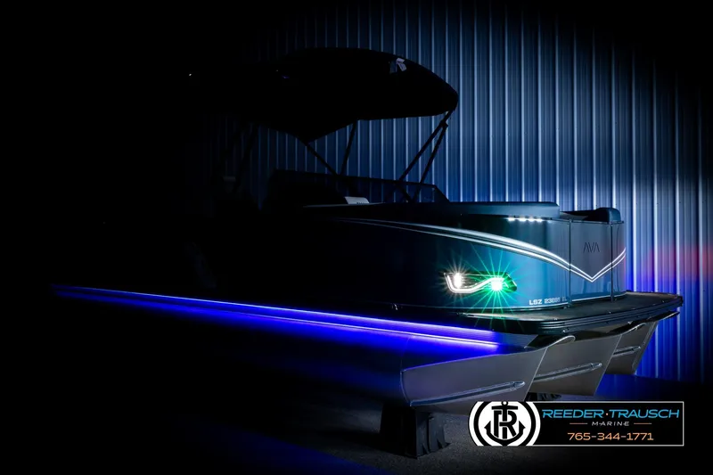 Slide: The Image of Luxurious 2026 Avalon LSZ ELW pontoon boat with vibrant LED lighting. - 4