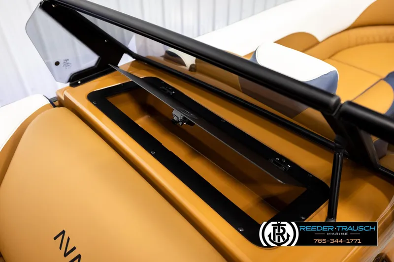 Slide: The Image of 2026 Avalon LSZ ELW boat interior with tan seating and black accents. - 43