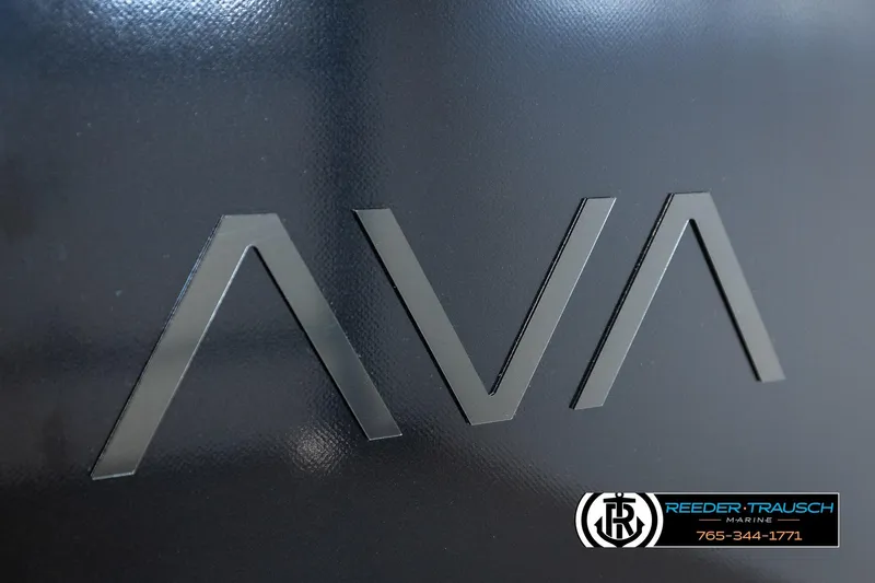 Slide: The Image of 2026 Avalon LSZ ELW logo on sleek black surface, Reeder-Trausch Marine branding. - 46