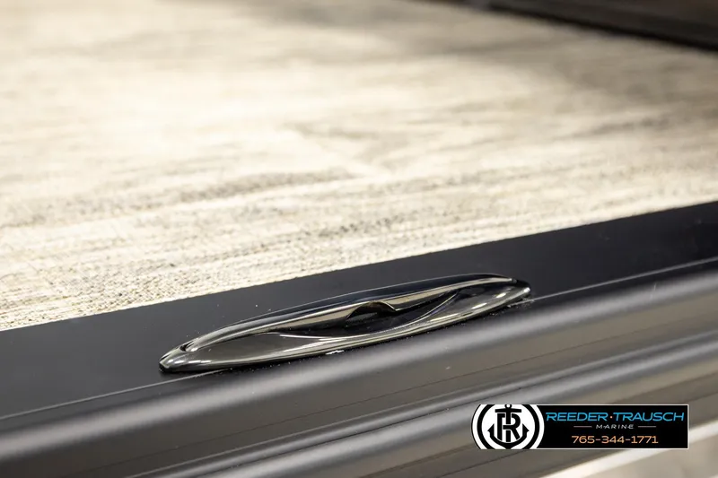 Slide: The Image of 2026 Avalon LSZ ELW boat detail with sleek design and Reeder-Trausch Marine logo. - 50