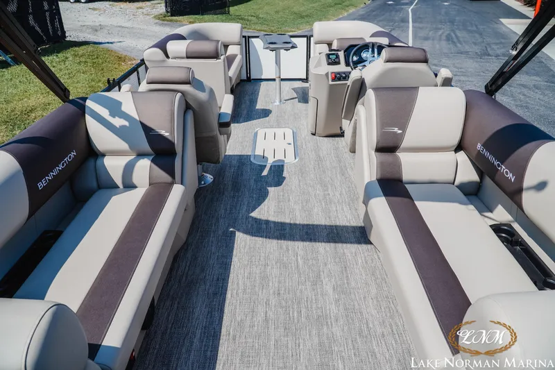 Slide: The Image of 2026 Bennington 22SSR pontoon boat interior with luxurious seating and modern design. - 3