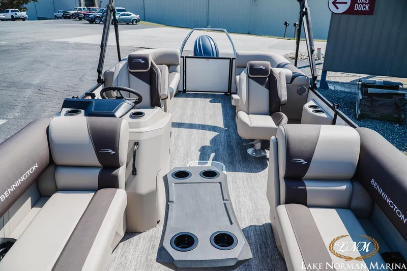 Slide: The Image of 2026 Bennington 22SSR pontoon boat interior with plush seating and modern design. - 9