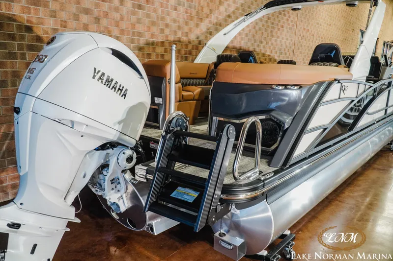 Slide: The Image of 2026 Bennington 25QFBA pontoon boat with Yamaha engine at Lake Norman Marina. - 17