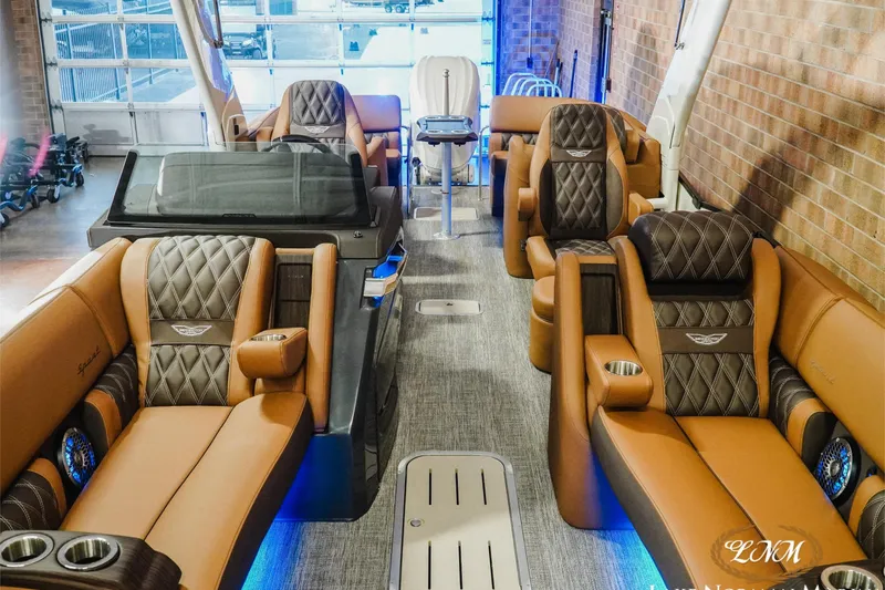 Slide: The Image of Luxurious interior of 2026 Bennington 25QFBA boat with plush seating and modern design. - 6