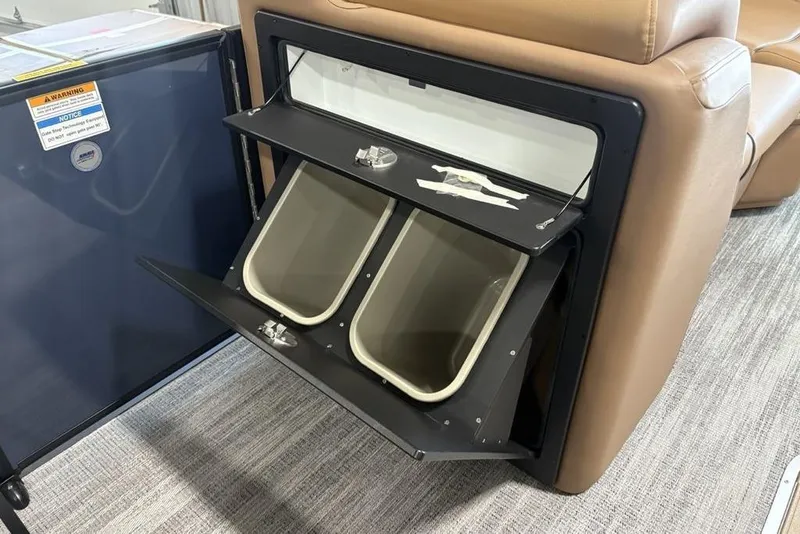 Slide: The Image of Interior of 2026 Godfrey Sweetwater 2286 QS with built-in storage compartments. - 10