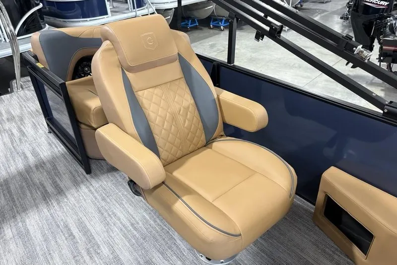 Slide: The Image of Luxurious tan seating on 2026 Godfrey Sweetwater 2286 QS pontoon boat. - 22