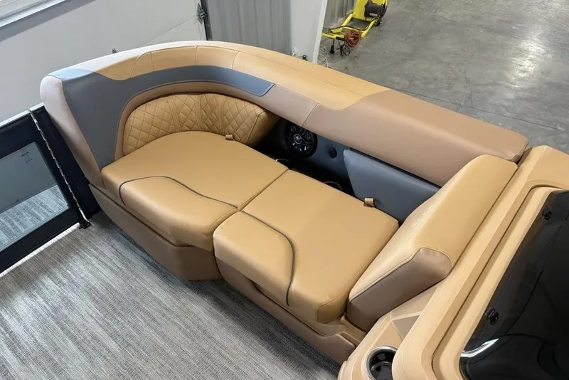 Slide: The Image of Luxurious seating on 2026 Godfrey Sweetwater 2286 QS pontoon boat, featuring tan upholstery. - 31