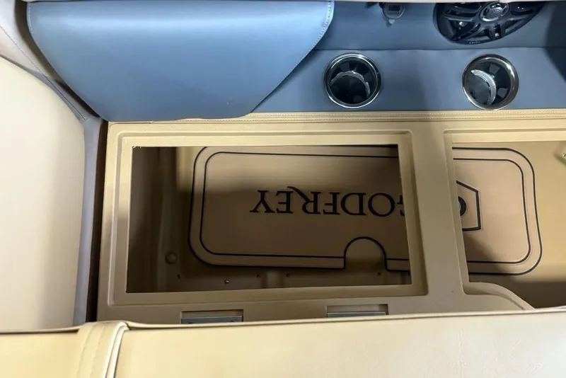 Slide: The Image of Interior of 2026 Godfrey Sweetwater 2286 QS with cup holders and storage compartment. - 5
