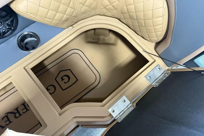 Slide: The Image of 2026 Godfrey Sweetwater 2286 QS boat interior storage compartment with quilted seating. - 6