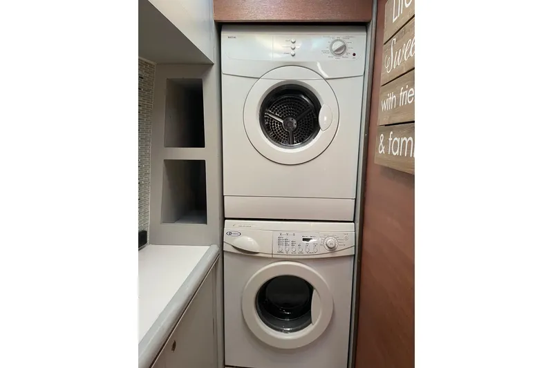 Slide: The Image of Stacked washer and dryer in aft Cabin - 42