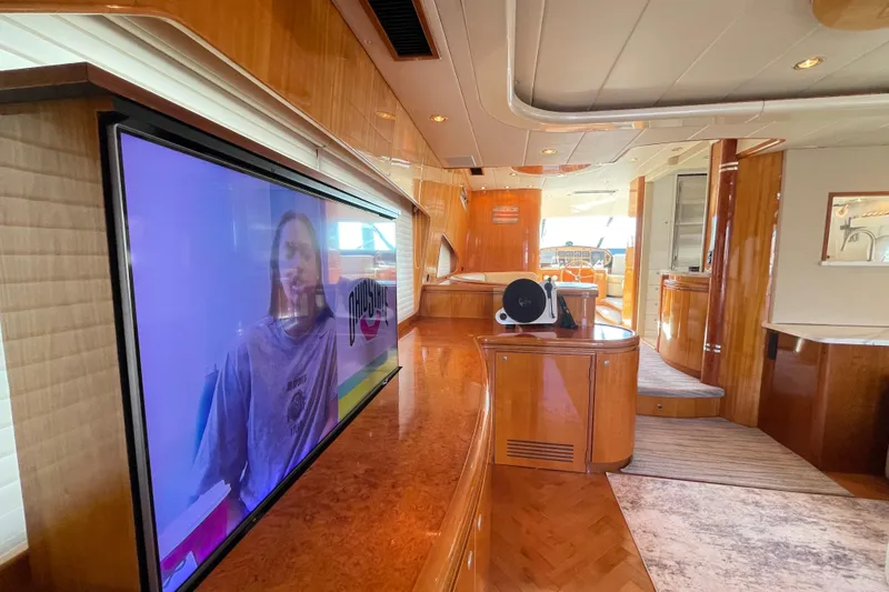 Slide: The Image of Portside salon with retractable TV - 9