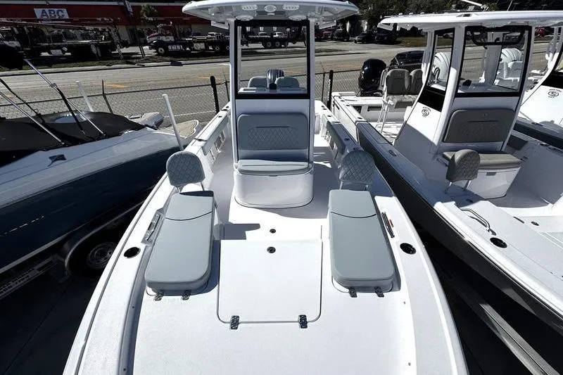 Slide: The Image of 2026 Sportsman Masters 227 Bay Boat with sleek design and spacious seating. - 4