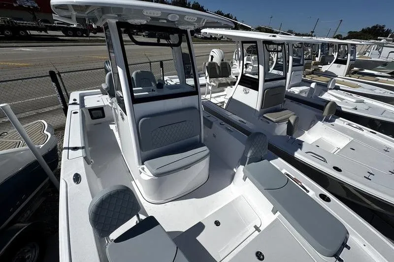 Slide: The Image of 2026 Sportsman Masters 227 Bay Boat with sleek design and spacious seating. - 5