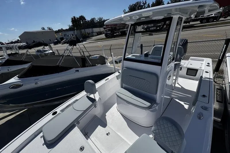 Slide: The Image of 2026 Sportsman Masters 227 Bay Boat with sleek design and spacious deck. - 6