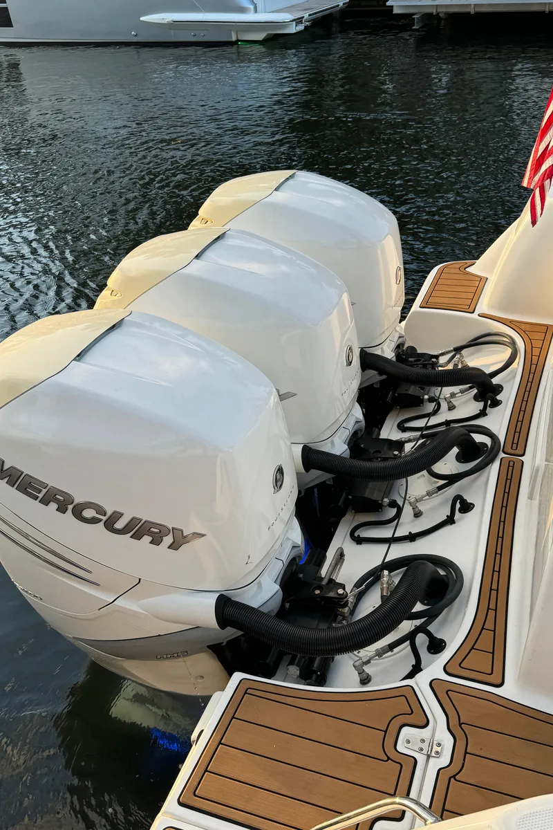 Slide: The Image of 2017 Boston Whaler 370 Outrage with triple Mercury outboard engines on water. - 3