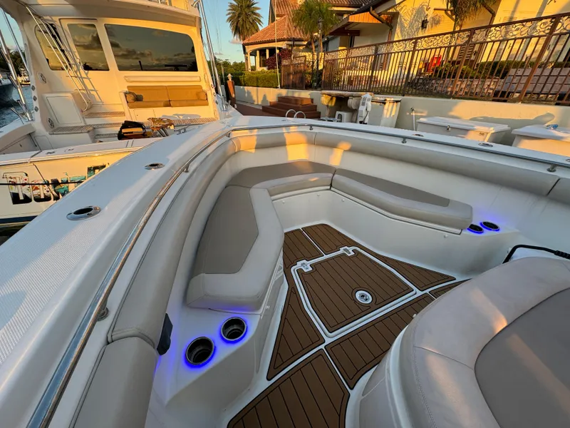 Slide: The Image of 2017 Boston Whaler 370 Outrage boat with spacious seating and elegant deck lighting. - 38