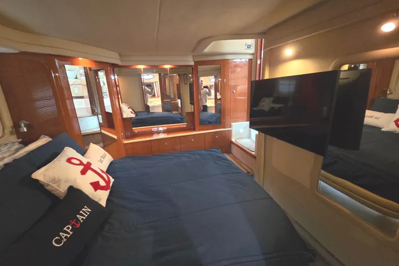 Slide: The Image of Luxurious cabin interior of 2000 Sea Ray 420 Aft Cabin yacht with modern amenities. - 18