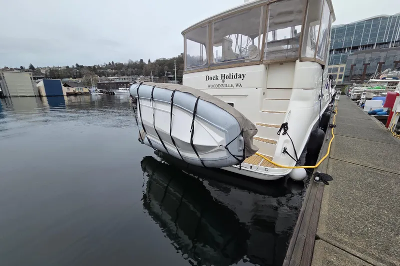 Slide: The Image of Sea Ray 420 Aft Cabin yacht docked with dinghy, 2000 model, Woodinville, WA. - 25