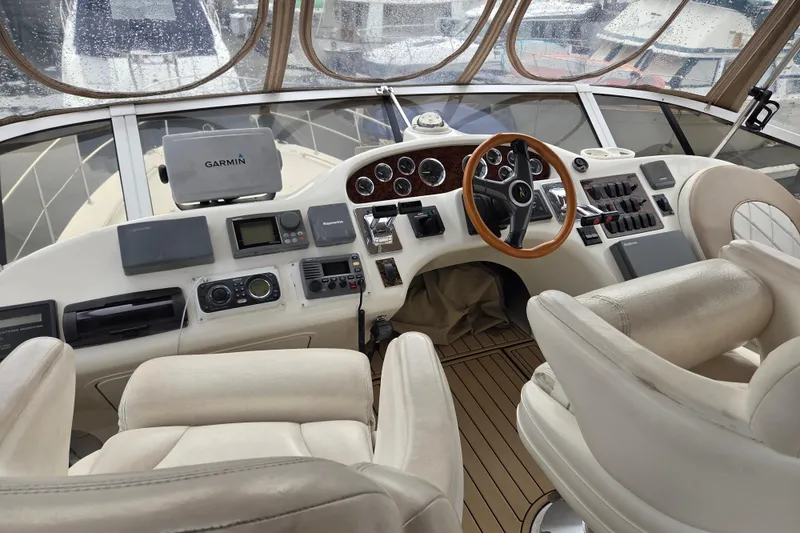 Slide: The Image of Cockpit of 2000 Sea Ray 420 Aft Cabin yacht with Garmin navigation system. - 4