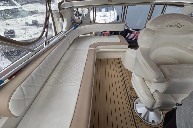 Slide: The Image of Luxurious interior of 2000 Sea Ray 420 Aft Cabin yacht with plush seating. - 6