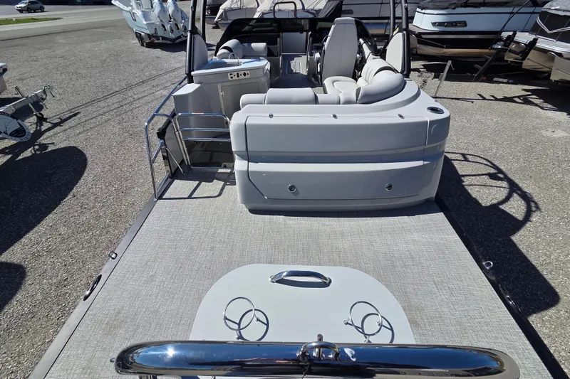 Slide: The Image of 2026 Avalon Platinum Catalina 2785 Elite Windshield boat, rear view with seating and deck. - 12