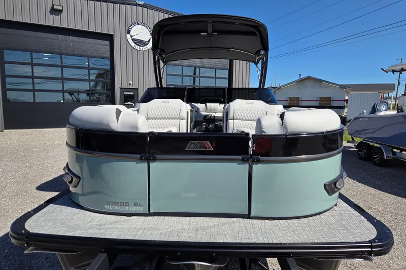 Slide: The Image of 2026 Avalon Platinum Catalina 2785 Elite Windshield pontoon boat at marina. - 5