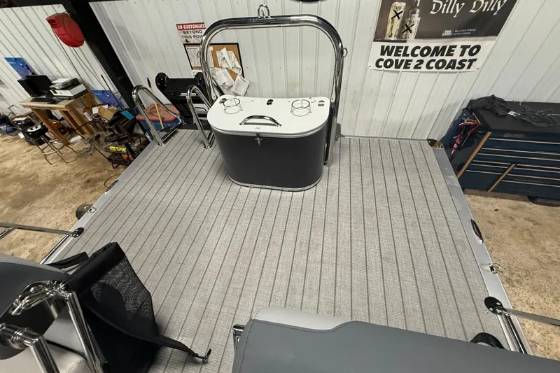 Slide: The Image of 2026 Avalon Catalina Quad Lounger Shift Windshield in a workshop setting. - 12