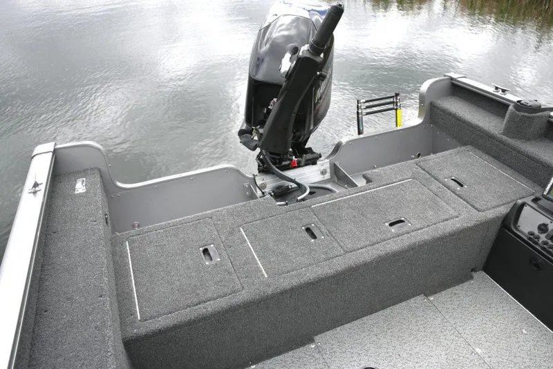 Slide: The Image of Manufacturer Provided Image: 2021 Lund 1775 Pro Guide fishing boat with outboard motor on a calm lake. - 23