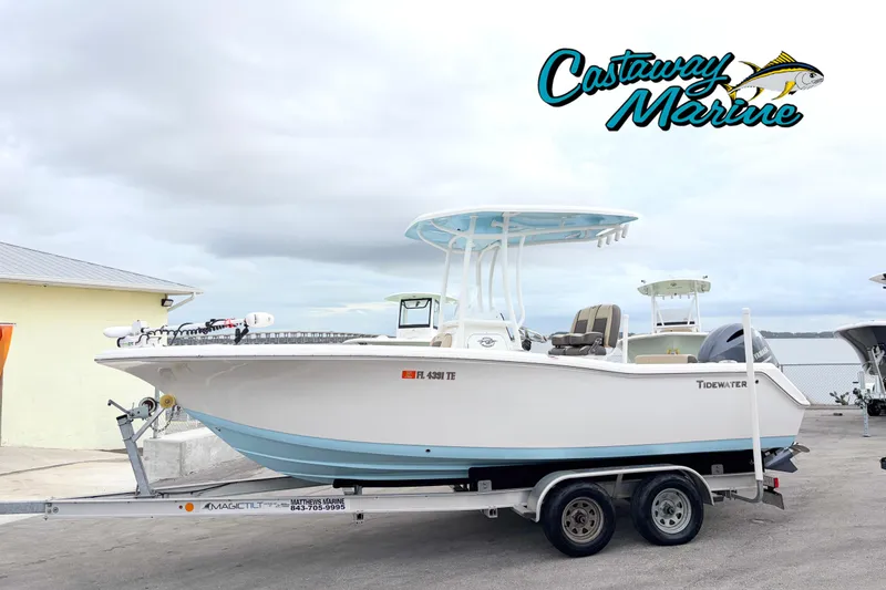 The Image of 2022 Tidewater 220 CC Adventure boat on trailer at Castaway Marine dealership. - 0