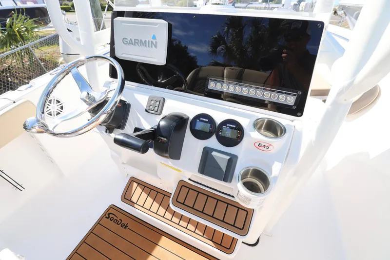 Slide: The Image of Control panel of 2022 Tidewater 220 CC Adventure boat with Garmin navigation system. - 4