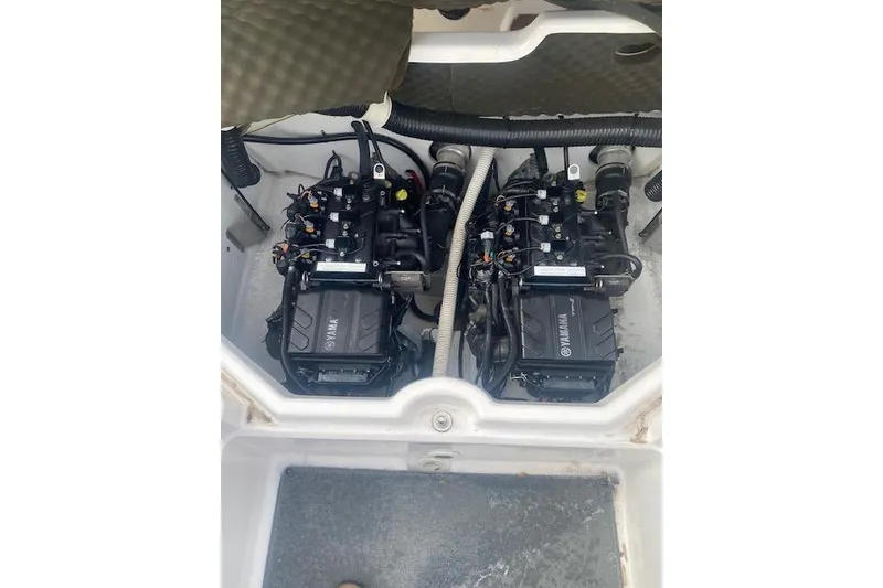 Slide: The Image of 2017 Yamaha AR210 boat engine compartment with dual engines visible. - 13